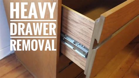 metal glide cabinet drawer removal